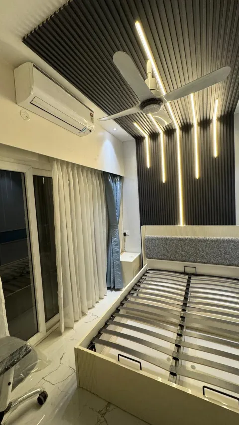 Bedroom with linear LED ceiling lights