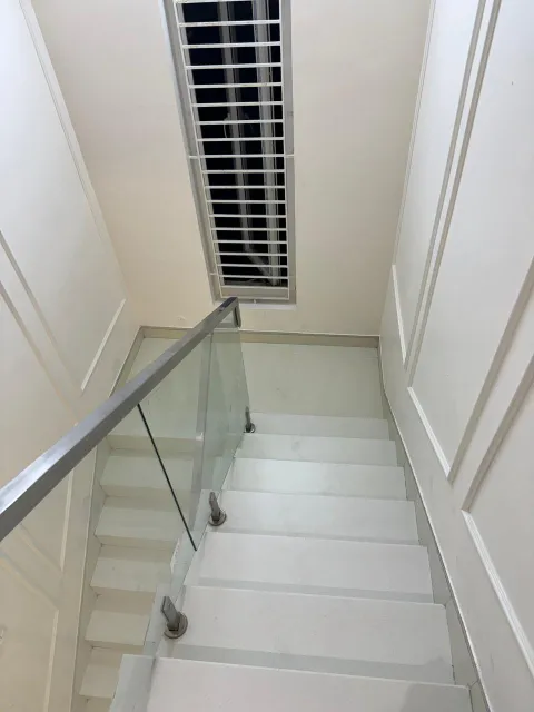 Staircase with glass railing